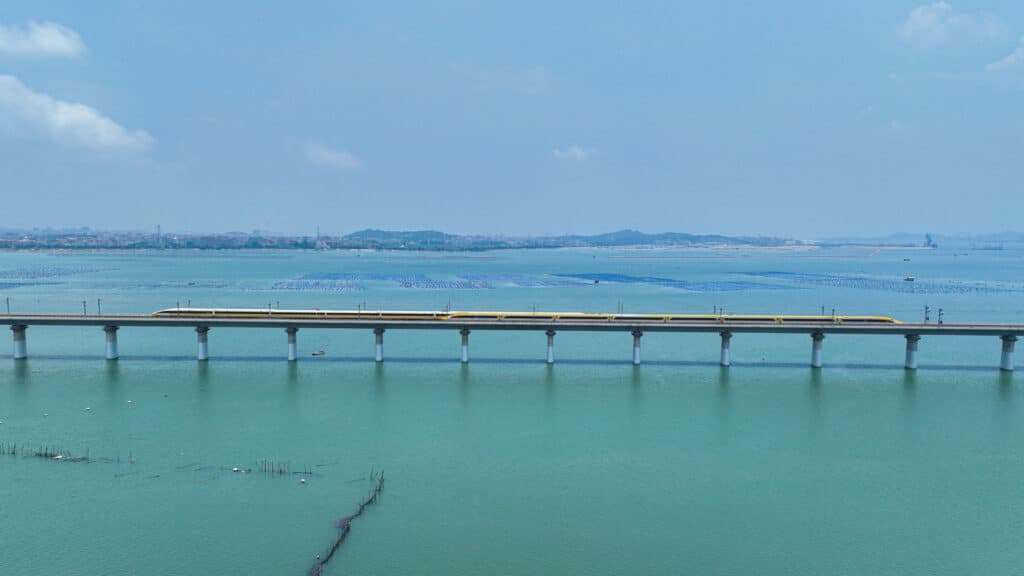 The Shanghai Maglev crossing a bridge during its trial as the world's fastest train