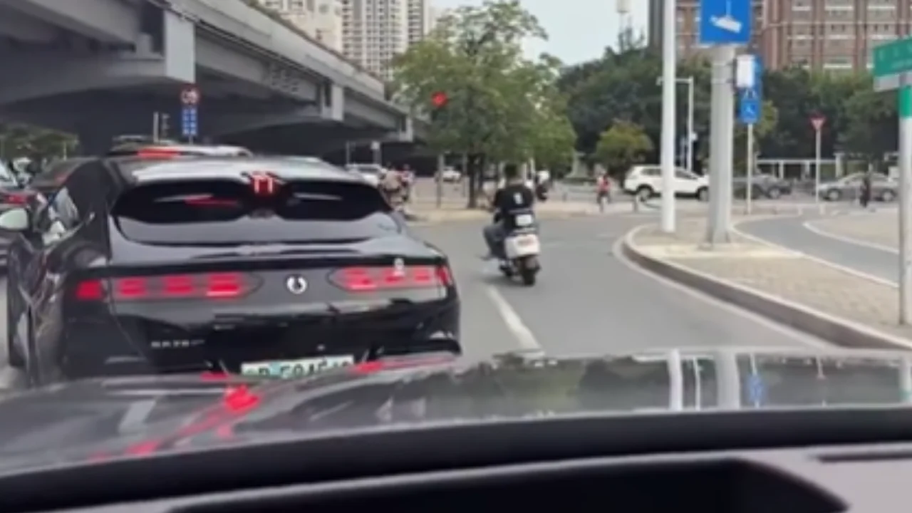 Chinese car uses its 'crab walk' feature to allow vehicle to pass by it in smoothest way possible
