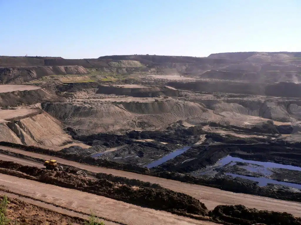 Massive mines such as these are responsible for discoveries such as the lithium ore deposit in China.