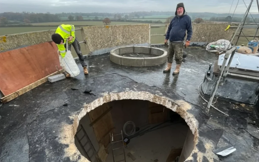 It takes a bold industrial designer to look past rust and concrete and turn a towering water tower into a truly quirky home.