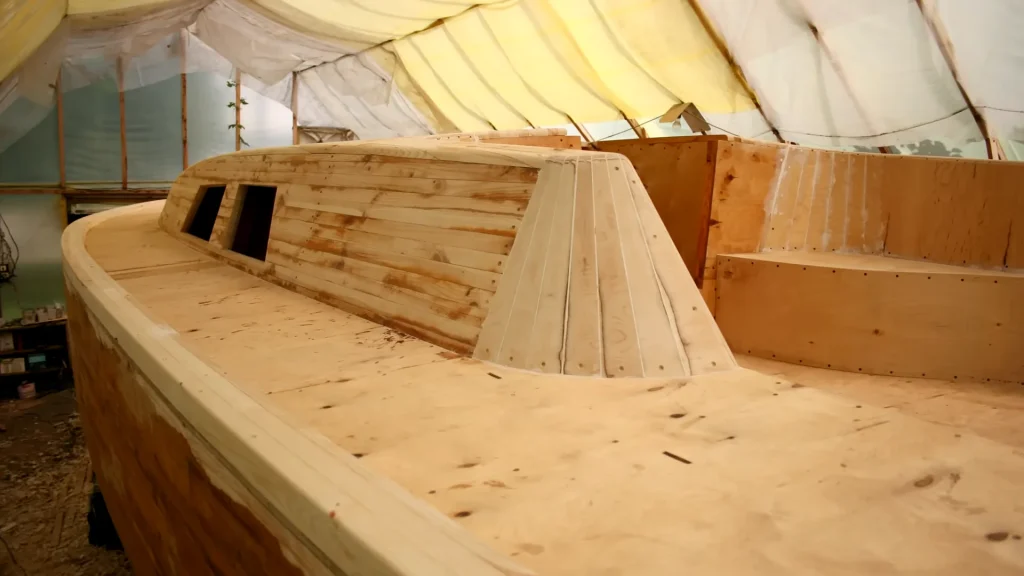 Couple spent 10 years building two huge homemade yachts in their backyard and one looks like it came straight out of a factory