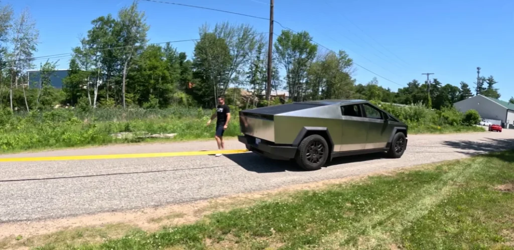 A 2024 Tesla Cybertruck took on 2004 diesel military Humvee in a tug-of-war and it ended up being a total domination
