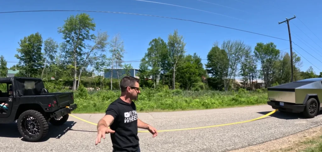 A 2024 Tesla Cybertruck took on 2004 diesel military Humvee in a tug-of-war and it ended up being a total domination