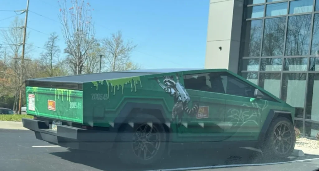 Tesla Cybertruck owner proves they have sense of humor by giving car full dumpster wrap