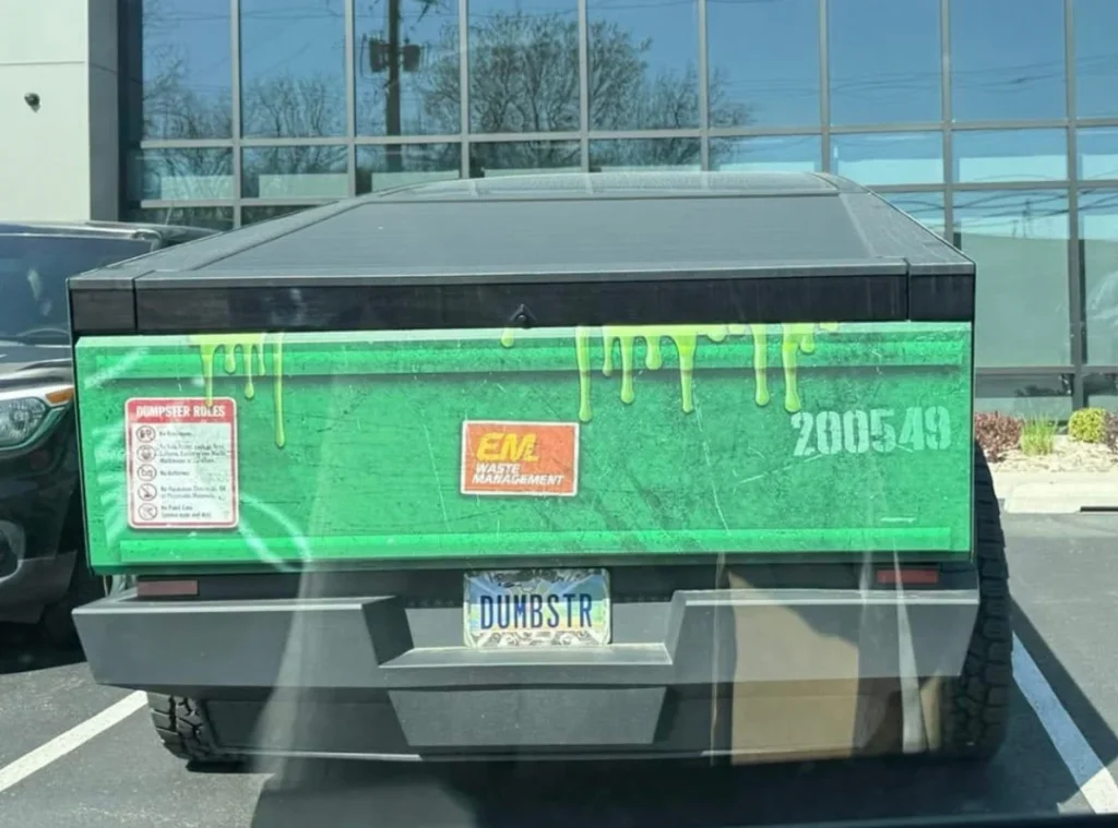 Tesla Cybertruck owner proves they have sense of humor by giving car full dumpster wrap