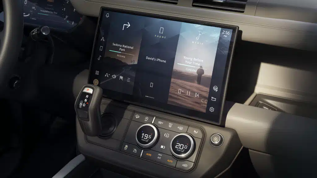 The 2026 Land Rover Defender gains smoked lights, a gloss black grille, and a new Defender touchscreen in this Land Rover update to the Defender interior