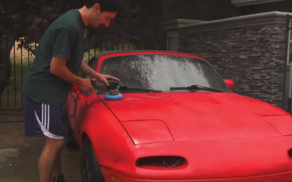 This Miata car paint job was a DIY car project involving a full garage respray and bodywork repair, completed at home with no professional help