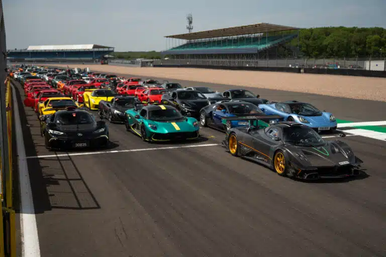 The 2025 supercar meet at Silverstone Circuit featured a rare hypercar lineup, including a Bugatti Veyron tribute, with over $1B in cars on display