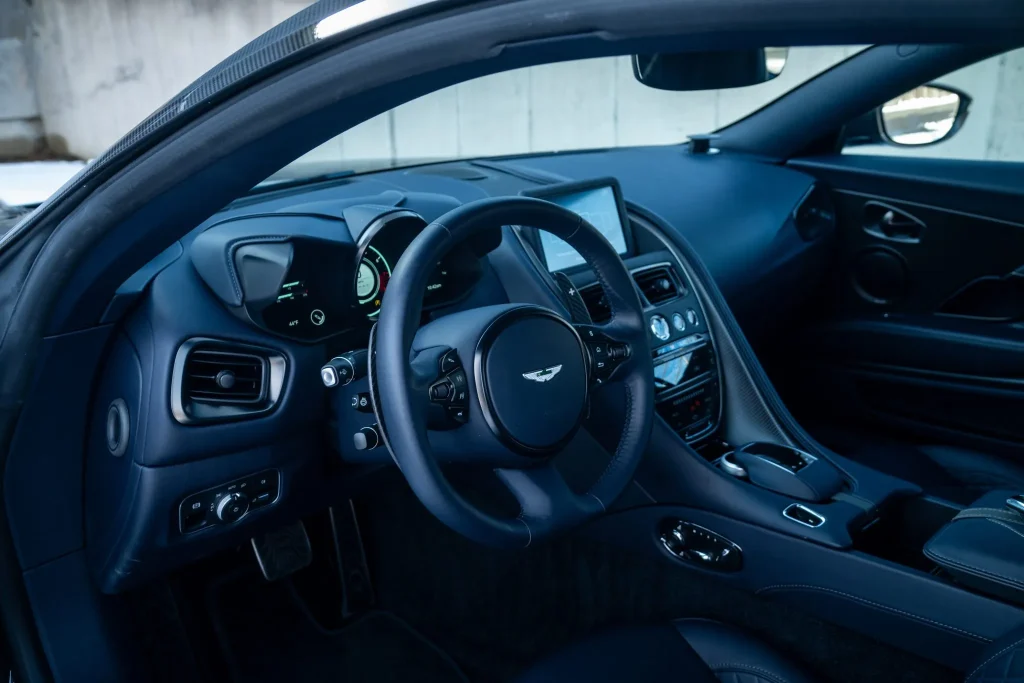 A low-mileage Aston Martin DBS 770 luxury coupe returned to the market sooner than expected, with a resale result that surprised many