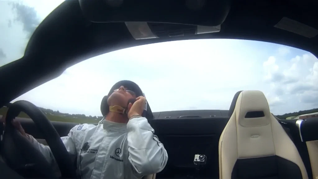 Pro golfer Jake Shepherd launches 180mph shot from 902 feet away and David Coulthard catches it in moving Mercedes