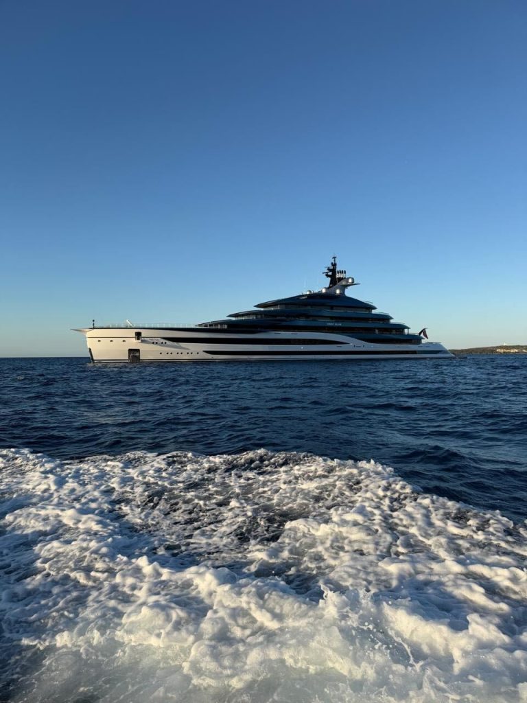 Supercar Blondie surprised by one of the world's most secretive yachts sailing past her and its mystery is compelling