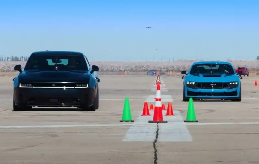 Dodge Charger Daytona EV outsprints Mustang Dark Horse in Edmunds’ U-Drags, showing how an EV muscle car compares with classic V8 power