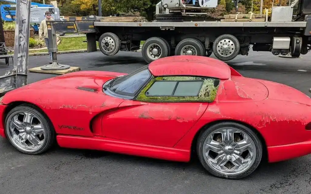 Dodge Viper brought down from Kentucky car dealership sign and shocked everyone also caused a mystery