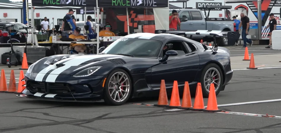 Dodge Viper ACR faces off against a Chevy Corvette Grand Sport and a BMW before the winner clearly emerges at over 200mph