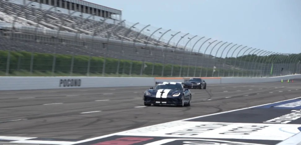 Dodge Viper ACR faces off against a Chevy Corvette Grand Sport and a BMW before the winner clearly emerges at over 200mph