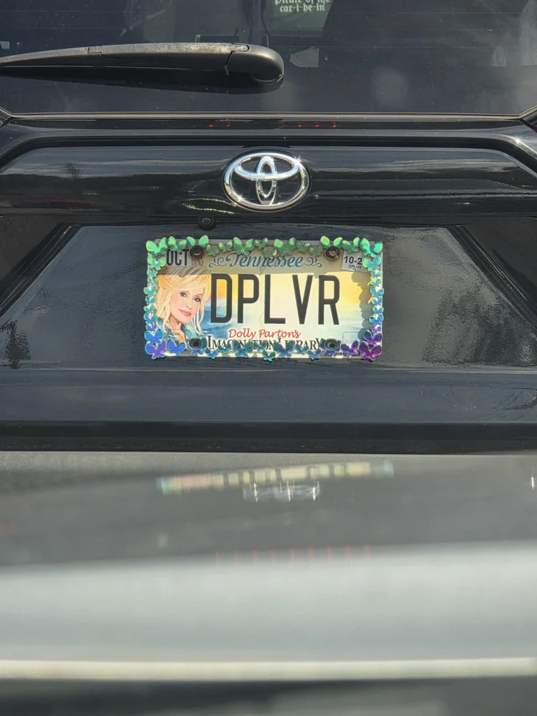 Working 9 to 5 is worth it just to flaunt this incredible custom Dolly Parton license plate