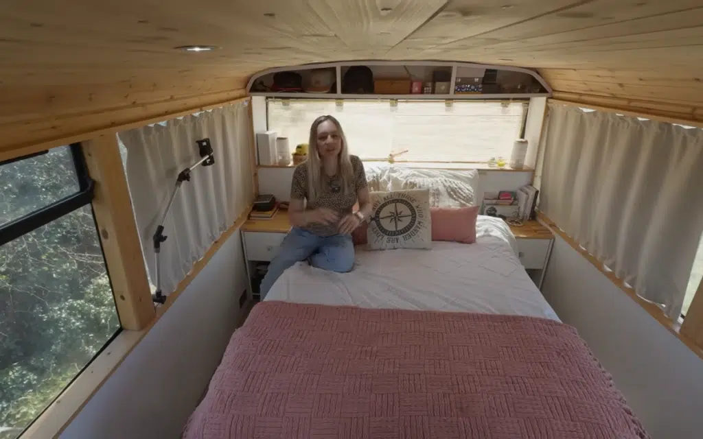 Double-decker bus converted into mobile home with a secret bedroom