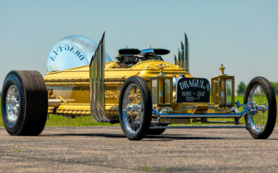 This coffin has been transformed into a four-wheeled V8 Dragula replica