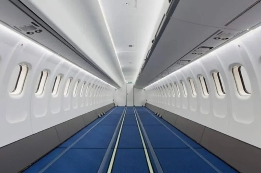 This is what a Boeing 787 looks like before seats are installed and it's totally surreal to see