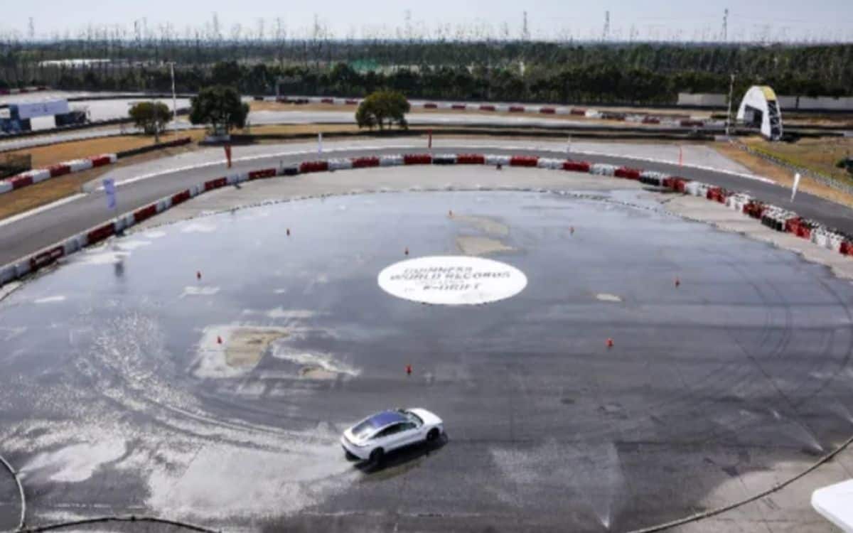An aerial view of the drifting record on a wet track being broken.