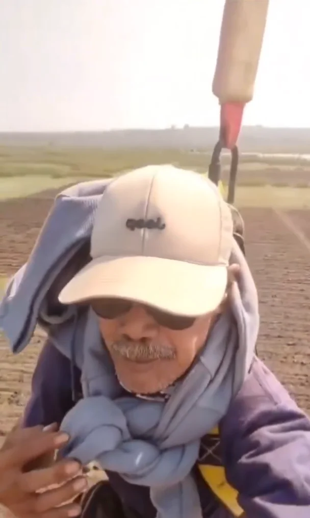 People are saying Indonesian farmer is 'living in 2070' as he uses drone to fly to work