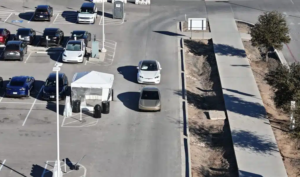 Drone flyover at Giga Texas shows what the Tesla Cybercab looks like and the pictures reveal a big surprise that the internet is trying to figure out