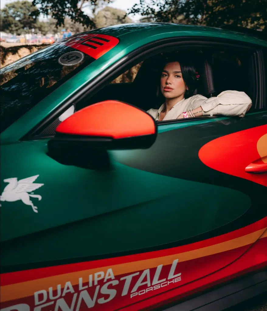Dua Lipa and her custom Porsche 911 GT3 RS sports car at the Goodwood Festival of Speed