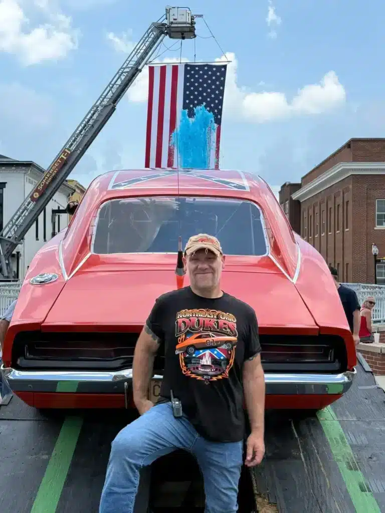 Iconic Dukes of Hazzard General Lee car flies through the air as it jumps Kentucky fountain
