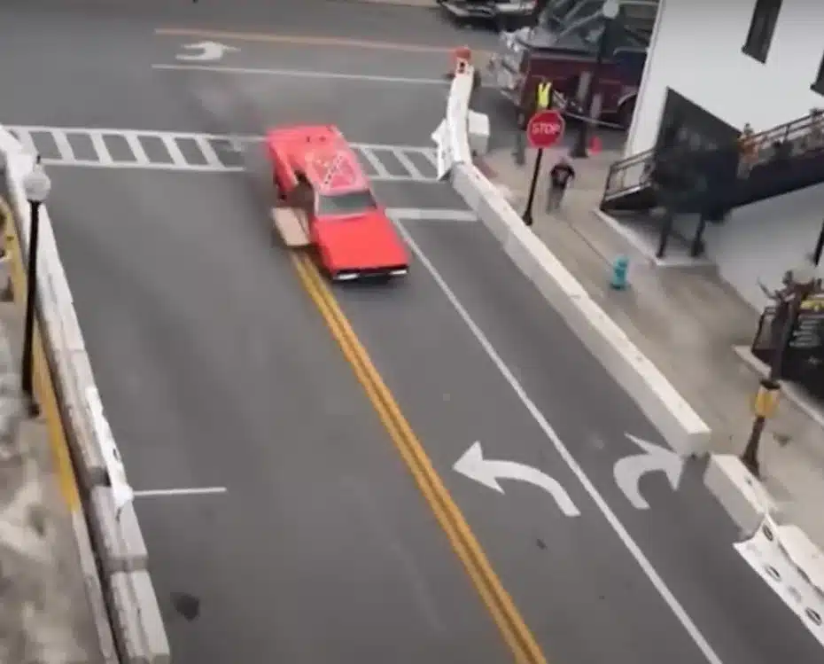 Iconic Dukes of Hazzard General Lee car flies through the air as it jumps Kentucky fountain