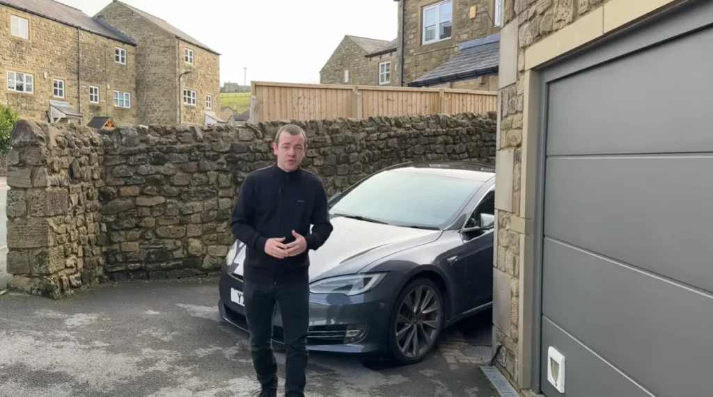 Man compares gas and electric car costs in 2026 to see which is cheaper to see if the EV advantage has eroded