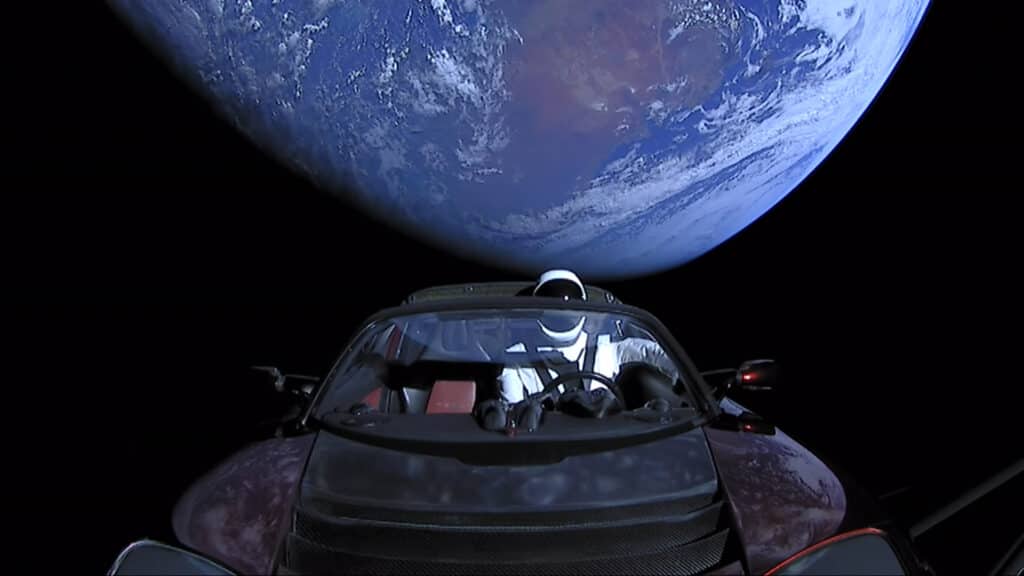 Tesla Roadster in space with Starman at the wheel