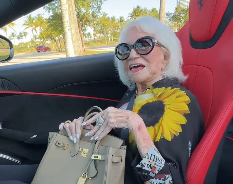 A 102-year-old mom rides in a Ferrari Roma with her Birkin bag in a viral TikTok video that’s spreading joy across social media