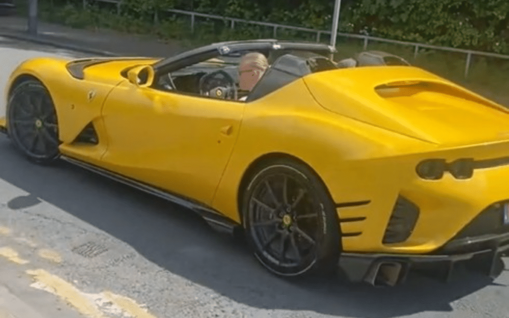 Erling Haaland leaving training in his brand new convertible Ferrari