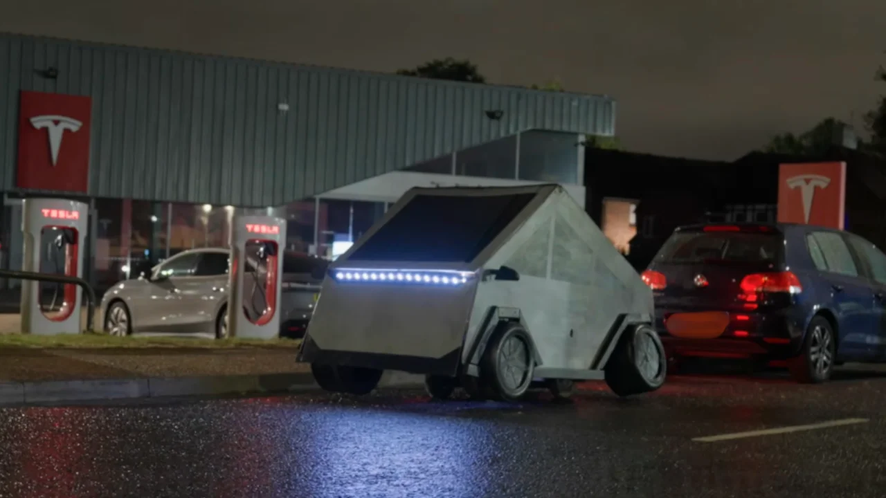 Man built a fake Cybertruck and slept in it outside Tesla dealership before staff came out and delivered their verdict on the car