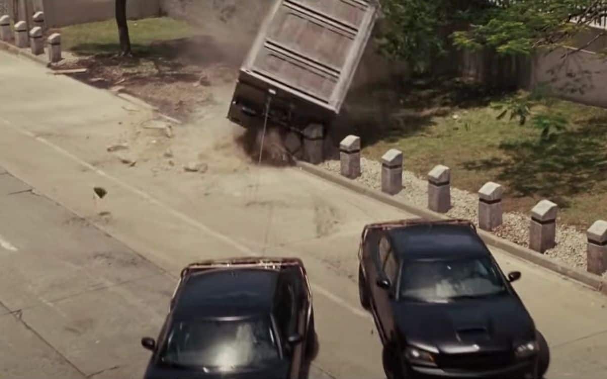 The bank vault is towed around a corner in Fast Five, the best car chase ever.