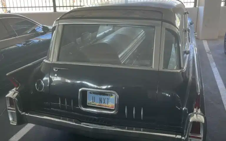 Gymgoer spots car at his gym with a coffin in the back and a very ominous license plate