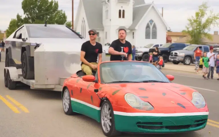 Porsche 911 wrapped as a watermelon had to tow Tesla Cybertruck after it died