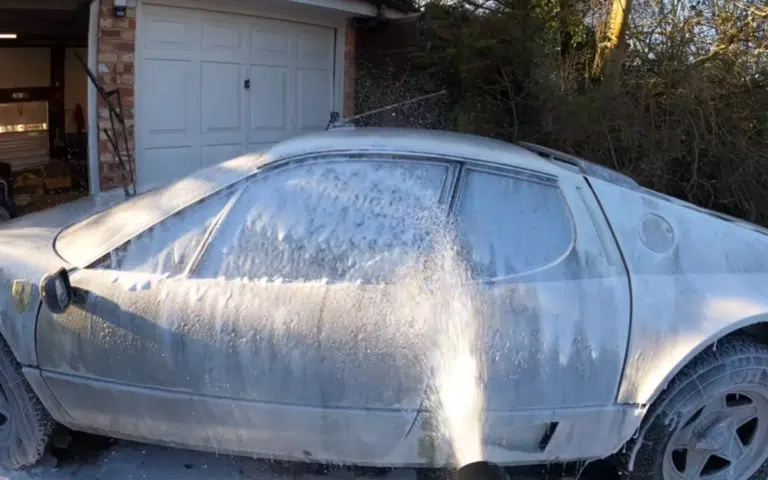 Watch this neglected Ferrari 512BBi being washed for first time in 12 years, incredible transformation