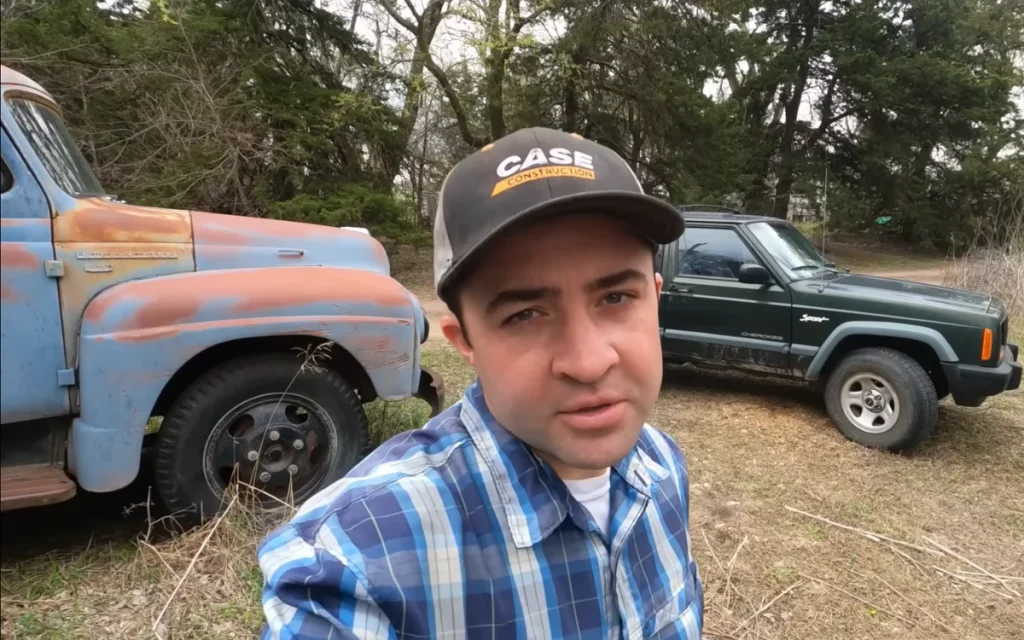 While cleaning up abandoned farm he bought, this man discovered a goldmine of classic cars beneath trees