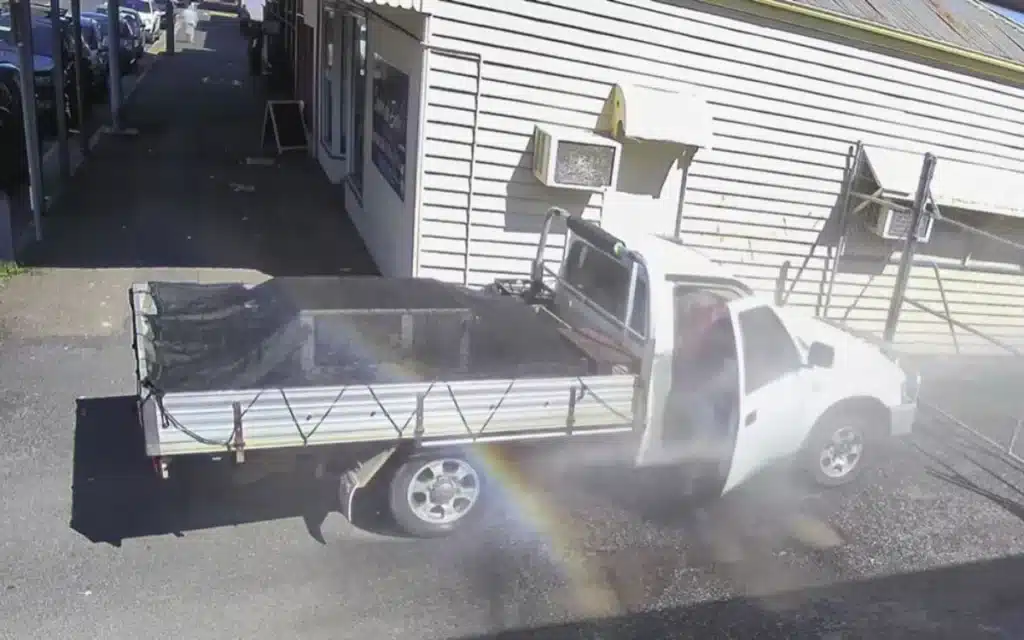 Man delivers instant karma with his sprinklers for any drivers who try and park in his shop's driveway