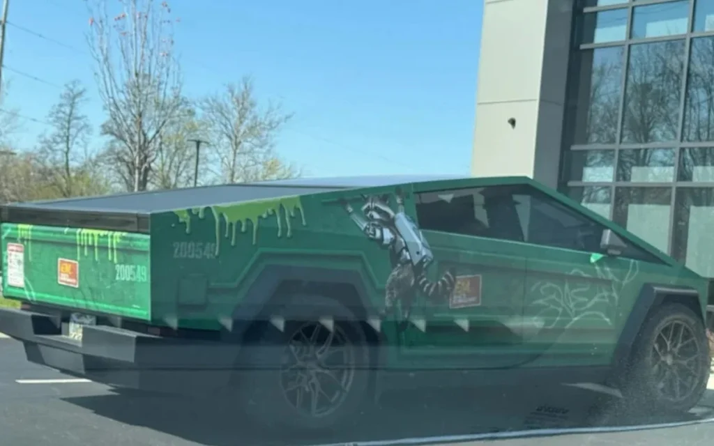 Tesla Cybertruck owner proves they have sense of humor by giving car full dumpster wrap