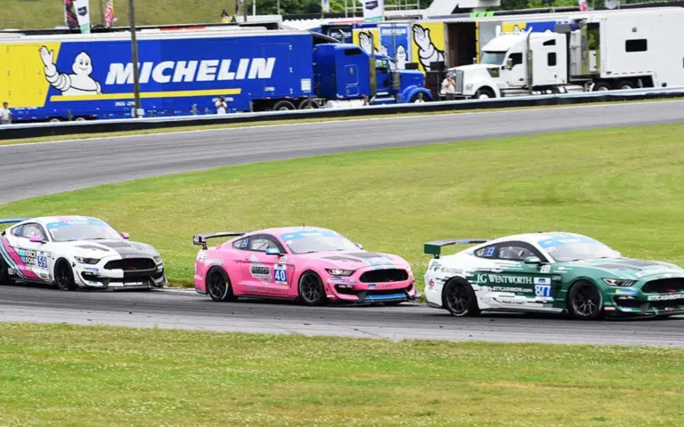 CEO of Ford is raced in the Mustang Challenge at Laguna Seca