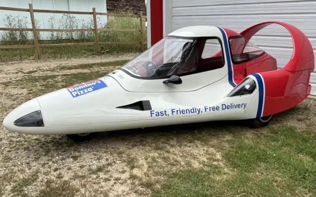 Three‑wheeled Domino’s pizza car with built‑in warmer hits auction block