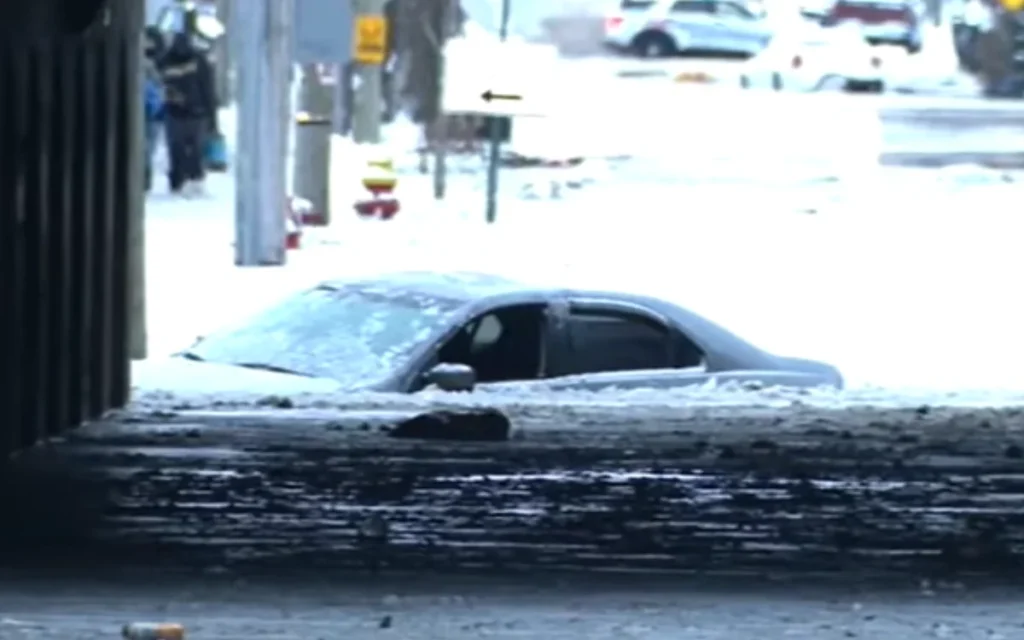 A water main broke and flooded Detroit neighborhood, freezing cars in the process