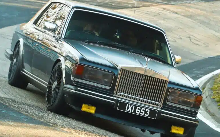 A cathedral of a Rolls-Royce tackles Nürburgring as a pro racer drive shows off old-school brakes, vintage suspension setup, and massive curb weight challenges