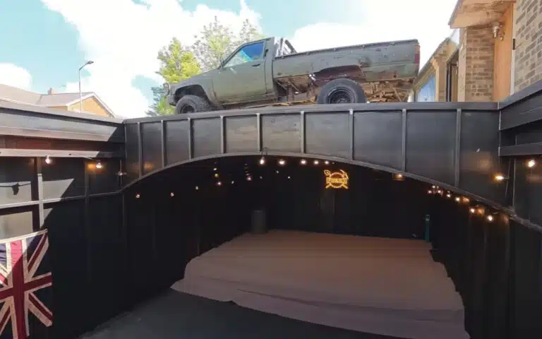 This secret underground garage features a hidden driveway, DIY garage design, and advanced concrete construction under a suburban home