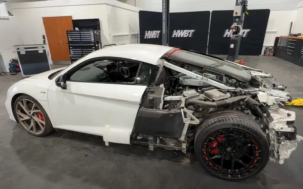This wrecked Audi R8 underwent a complete car restoration by a YouTuber, featuring performance mods and YouTube rebuild coverage before being gifted