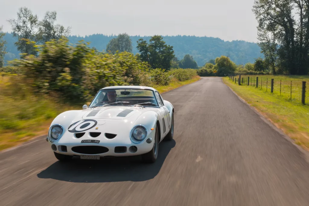 A Ferrari 250 GTO sports car sold for $38,500,000 at auction despite no longer being fully original