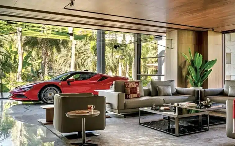 This businessman in India just parked his $1,000,000 Ferrari SF90 Stradale in his front room to use as the world's most expensive carbon fiber coffee table