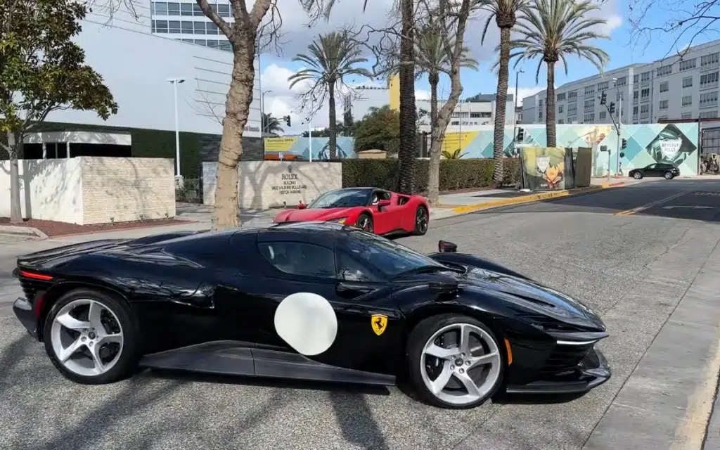 Man observing a $2.5M Ferrari Daytona SP3 supercar be delivered in Beverly Hills witnesses a 'whoops' moment